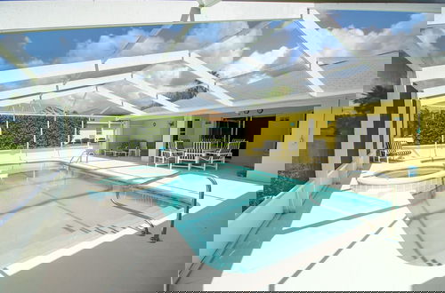 Photo 18 - Beautiful & Sunny Pool With Golf View 4 Bedroom Home by RedAwning