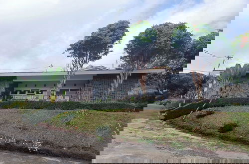 Foto 39 - Surga Family House
