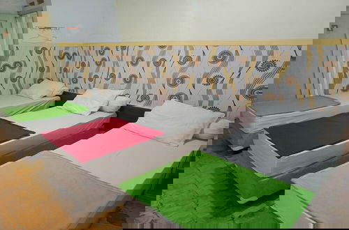 Foto 17 - Surga Family House