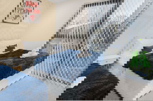 Photo 10 - Comfyluxe 2bed 2bath,central,sleeps7,arcademachine