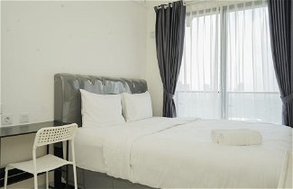 Photo 1 - Warm And Cozy Studio Room At Sky House Bsd Apartment