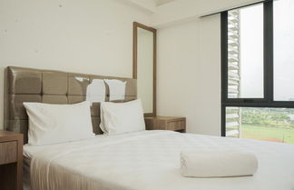 Photo 1 - Homey And Cozy Living 2Br At Sky House Bsd Apartment