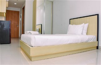 Photo 3 - Cozy Studio with Single Bed at Evenciio Margonda Apartment