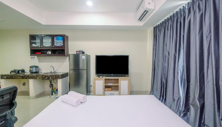 Photo 1 - Cozy with Minimalist Style Studio Apartment Nine Residence