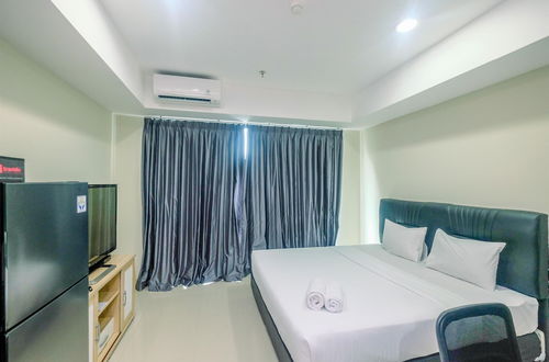 Photo 2 - Cozy with Minimalist Style Studio Apartment Nine Residence