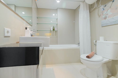 Photo 15 - Elegant and Comfy Studio Azalea Suites Apartment Cikarang