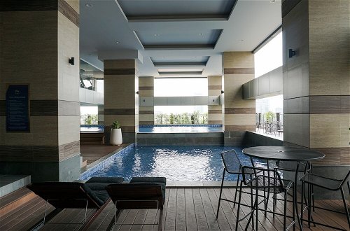 Foto 16 - Stunning 2BR Loft Apartment at Maqna Residence