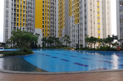 Photo 19 - Pool View and Homey 2BR Apartment @ Springlake Summarecon