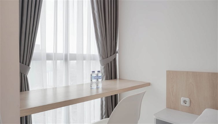 Foto 1 - Comfort And Warm Studio At Ciputra World 2 Apartment