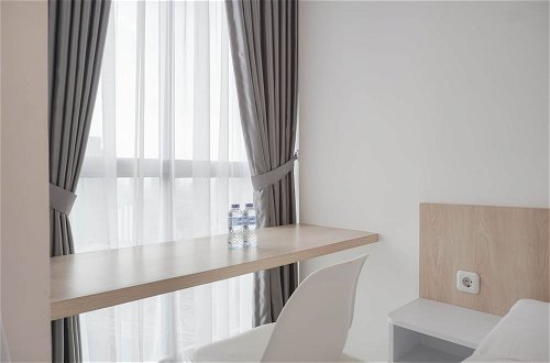 Photo 1 - Comfort And Warm Studio At Ciputra World 2 Apartment