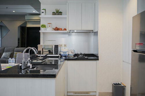 Photo 5 - Minimalist And Cozy 1Br At Branz Bsd City Apartment