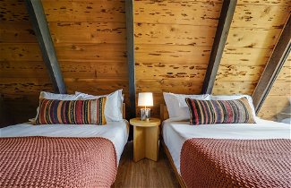 Foto 2 - Horizon by Avantstay Stunning A-frame Cabin w/ Hot Tub, Billiards, Lake Views