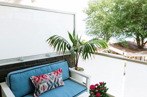 Photo 16 - Beachfront Studio With Rooftop Barbecue, Stunning Sea Views, and Smart TV set