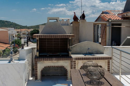 Photo 37 - Beachfront Studio With Rooftop Barbecue, Stunning Sea Views, and Smart TV set