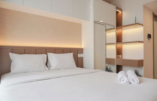 Foto 1 - Comfy And Warm Studio Room At Sky House Bsd Apartment