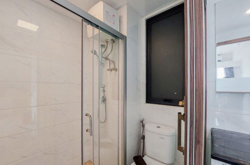 Photo 5 - Comfortable Design 2BR with Washing Machine Sky House BSD Apartment