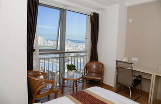 Photo 1 - Weihai Yinxiang Holiday Apartment