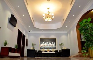 Photo 1 - President Suites