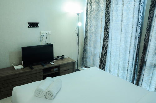 Foto 3 - Modern City View Studio Apartment at Puri Mansion