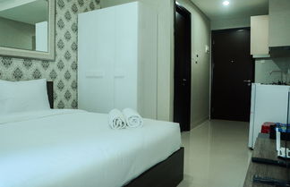 Photo 1 - Modern City View Studio Apartment at Puri Mansion