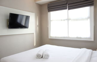 Foto 3 - Luxurious 1BR Apartment @ Parahyangan Residence