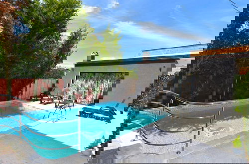Foto 8 - Welcoming Apartment With Shared Pool