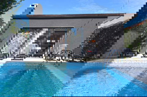 Foto 11 - Welcoming Apartment With Shared Pool