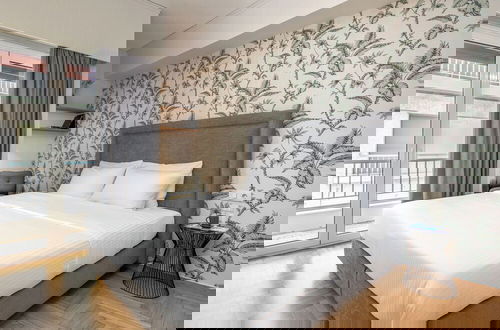 Foto 9 - The Beehive Apartments