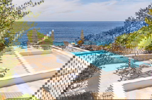 Foto 34 - Sunlit Shores Beach Villa With Pool, Gym and Sauna