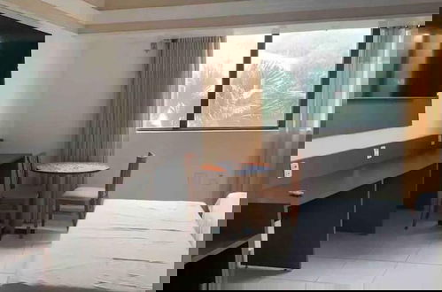 Foto 4 - Flat em Tropical Executive Hotel