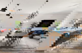 Foto 3 - Blue Hour Playfully Designed Beach Home w Hot Tub Fire Pit Game Room