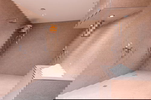 Photo 13 - Pleasant Apartment With Shared Sauna