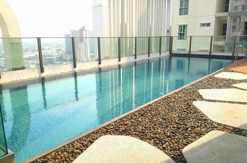 Foto 15 - Highrise Cityview Aspire Condo Gym Pool