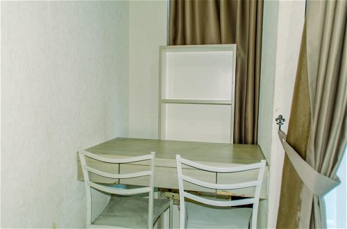 Photo 14 - Homey And Warm Studio Room At Tifolia Apartment