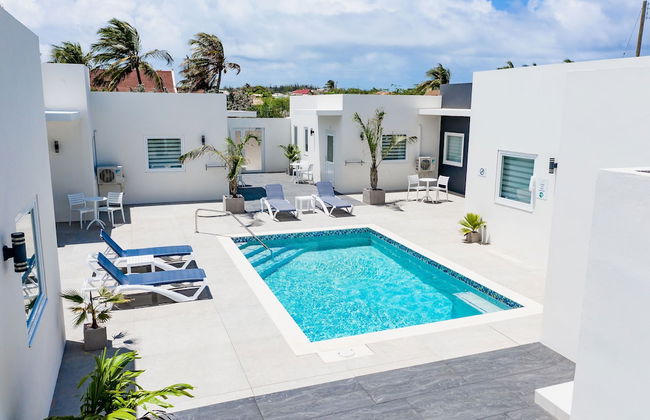 The Palm Leaf Apartments - Photo 22