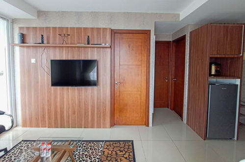 Photo 17 - Full Furnished With Comfort Design 2Br At Vivo Apartment