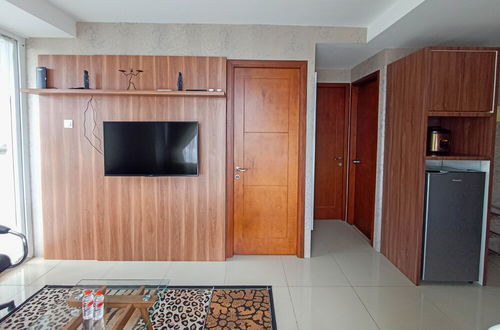 Photo 17 - Full Furnished With Comfort Design 2Br At Vivo Apartment