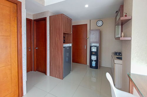 Photo 20 - Full Furnished With Comfort Design 2Br At Vivo Apartment