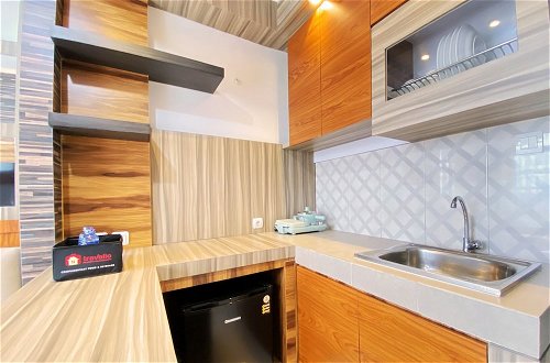 Foto 10 - Homey Designed And Cozy 2Br At Mekarwangi Square Cibaduyut Apartment