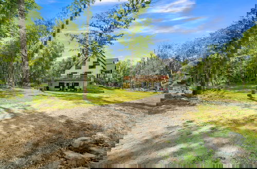 Photo 52 - Amazing Lake House With Beach Access 4 Bedroom Home by RedAwning