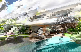 Foto 1 - Coastal Comfort: Cozy 4BR Villa, 5 Min Walk to Finns Beach