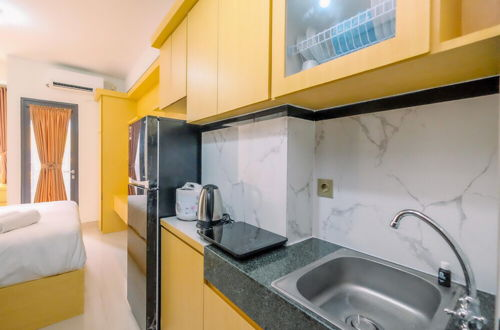 Foto 6 - Good Deal And Comfy Studio Apartment Transpark Cibubur