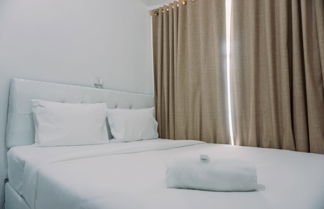 Foto 1 - Good Deal And Cozy 2Br At Apartment Amazana Serpong