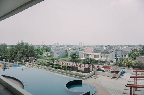 Photo 17 - Good Deal And Cozy 2Br At Apartment Amazana Serpong