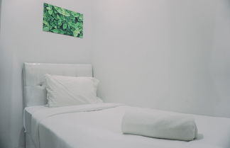 Photo 2 - Good Deal And Cozy 2Br At Apartment Amazana Serpong