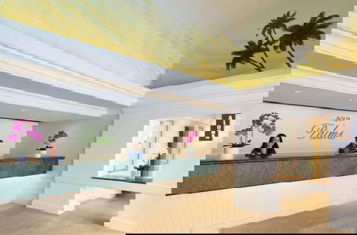 Foto 2 - Aqua Palms Condo with City View
