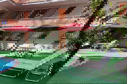 Photo 24 - Retro Oasis Hawaiian King Apartment 1 Bedroom Condo by RedAwning