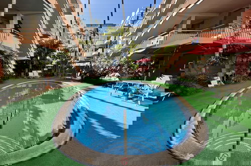 Photo 14 - Retro Oasis Hawaiian King Apartment 1 Bedroom Condo by RedAwning