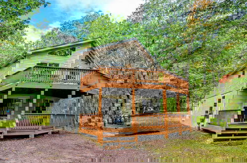 Photo 1 - The Bear Foot Lodge by Avantstay Game Room, Deck, Beach/lake Access