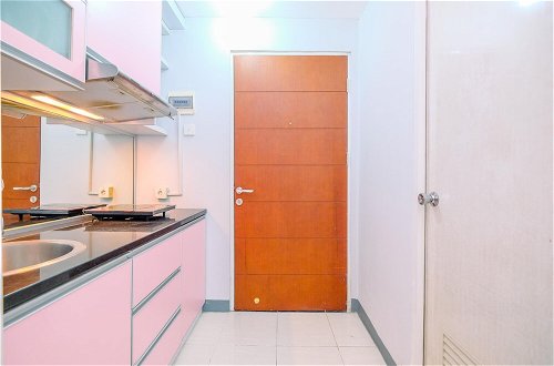 Foto 9 - Homey And Cozy Studio Room Taman Melati Margonda Apartment